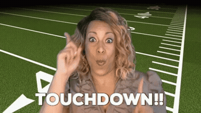 Woman In Front Of Football Field Saying Touchdown GIF