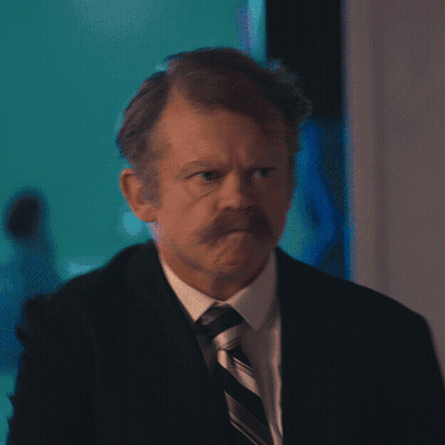 Woman In Front Of Honey I Am Home Picture GIF