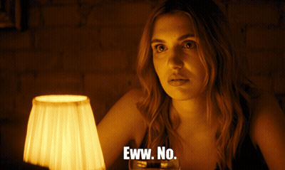 Woman In Front Of Lamp Saying Eww No GIF