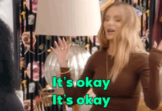 Woman In Front Of Lamp Saying It's Okay GIF
