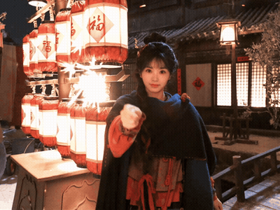 Woman In Front Of Lanterns With Fu GIF