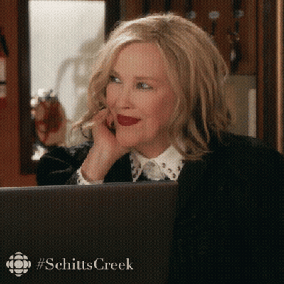 Woman In Front Of Laptop With #Schitts Creek GIF