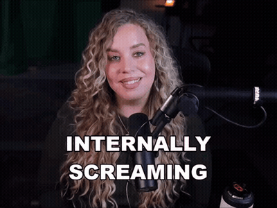 Woman In Front Of Microphone Internally Screaming GIF