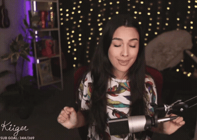 Woman In Front Of Microphone With Kiiger GIF