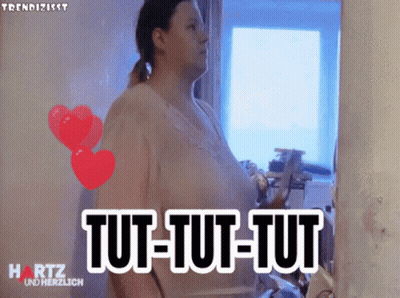 Woman In Front Of Mirror Saying Tut-Tut-Tut GIF