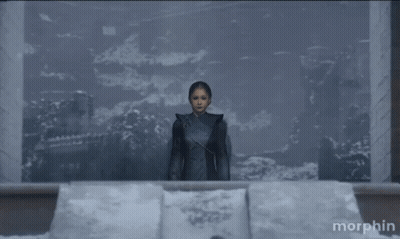 Woman In Front Of Morphin Wall GIF
