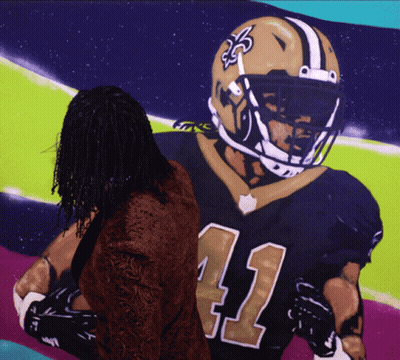 Woman In Front Of New Orleans Saints Painting GIF