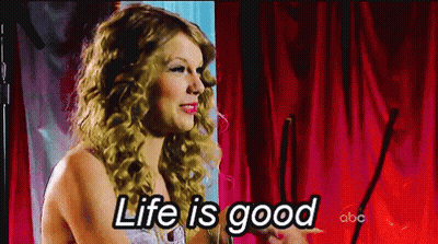 Woman In Front Of Red Curtain Saying Life Is Good GIF