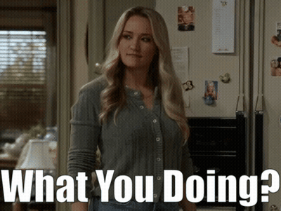 Woman in Front of Refrigerator Saying What You Doing