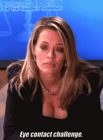 Woman In Front Of Screen Saying Angeles County GIF
