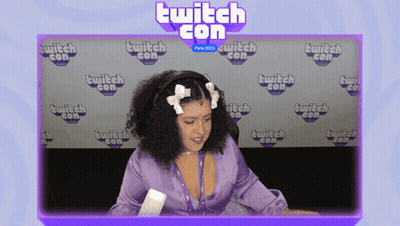 Woman In Front Of Twitch Con Background GIF