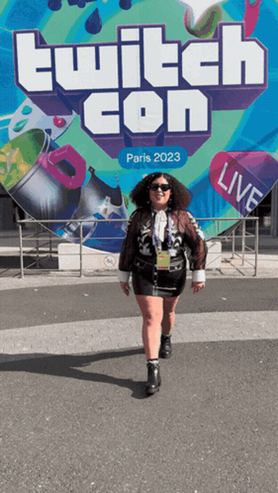 Woman In Front Of Twitch Con Paris 2023 Sign GIF