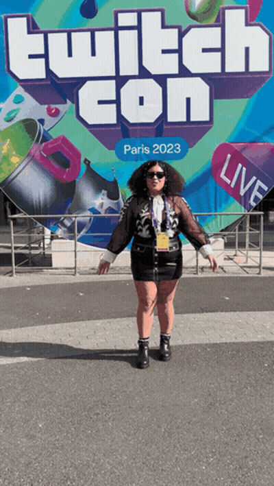Woman In Front Of Twitch Con Sign GIF