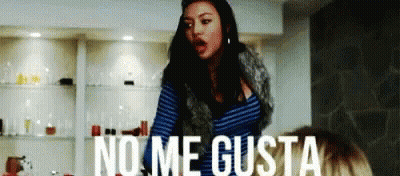 Woman In Front Of Wall Saying No Me Gusta GIF