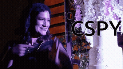 Woman In Front Of Wedding Cake With Cspy GIF