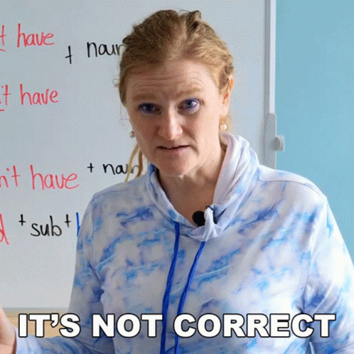 Woman In Front Of White Board Saying It's Not Correct GIF