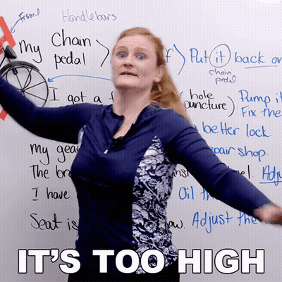 Woman In Front Of White Board Saying It's Too High GIF