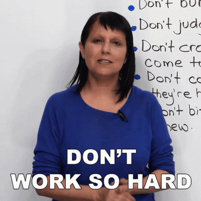 Woman In Front Of Whiteboard Saying Don't Work So Hard GIF