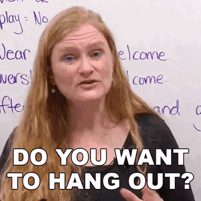 Woman In Front Of Whiteboard Says Do You Want To Hang Out GIF