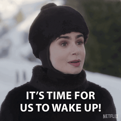 Woman In Fur Coat And Black Hat Says Wake Up GIF