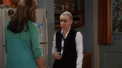 Woman In Fur Coat And Choker At Blackboard Saying Kurt GIF