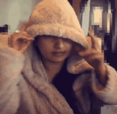 Woman In Fur Coat And Hooded Hat GIF