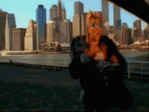 Woman In Fur Coat And Sunglasses GIF