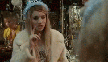 Woman In Fur Coat And Tiara Making Funny Face GIF