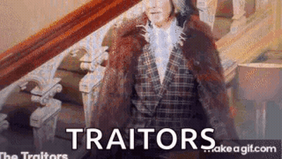 Woman In Fur Coat On Stairs Saying Traitors GIF