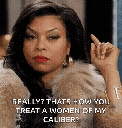 Woman In Fur Coat Pointing GIF