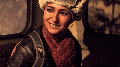 Woman In Fur Hat And Scarf Smiling GIF