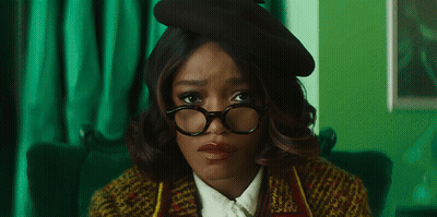Woman In Glasses And Beret Looking Sad GIF