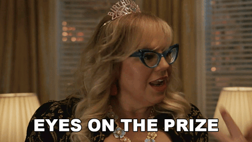 Woman In Glasses And Birthday Tiara Saying Eyes On The Prize GIF