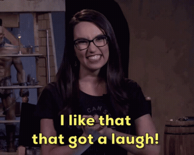 Woman In Glasses And Black Shirt Says I Like That That Got A Laugh GIF