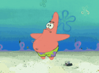 Woman In Glasses And Blue Shirt Making Face GIF