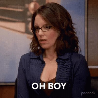 Woman In Glasses And Blue Shirt Saying Oh Boy GIF