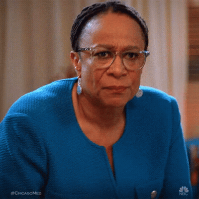 Woman In Glasses And Blue Sweater With #Chicagomed GIF