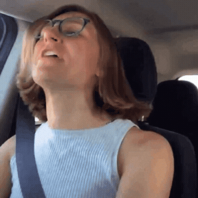 Woman In Glasses And Blue Tank Top GIF