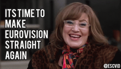 Woman In Glasses And Fur Coat Smiling It's Time To Make Eurovision Straight Again GIF