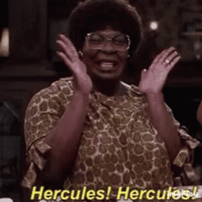 Woman In Glasses And Giraffe Print Shirt Laughing Hercules Hercules GIF