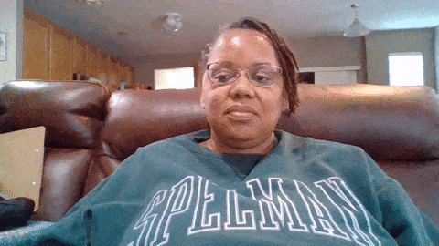 Woman In Glasses And Green Spellman Sweatshirt GIF
