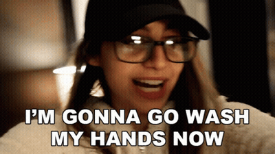 Woman In Glasses And Hat Saying I'm Gonna Go Wash My Hands Now GIF