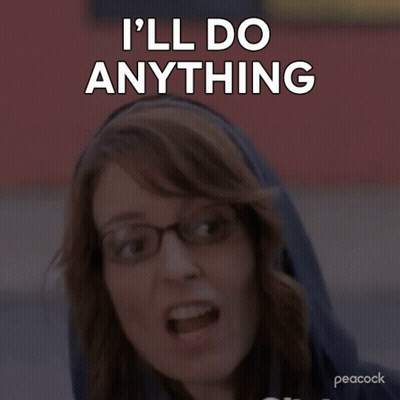 Woman In Glasses And Hoodie Saying I'll Do Anything GIF