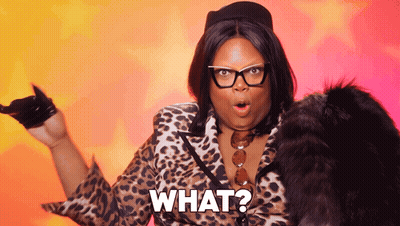 Woman In Glasses And Leopard Print Coat Saying What GIF