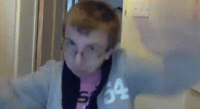 Woman In Glasses And Pink Shirt With Letter A GIF