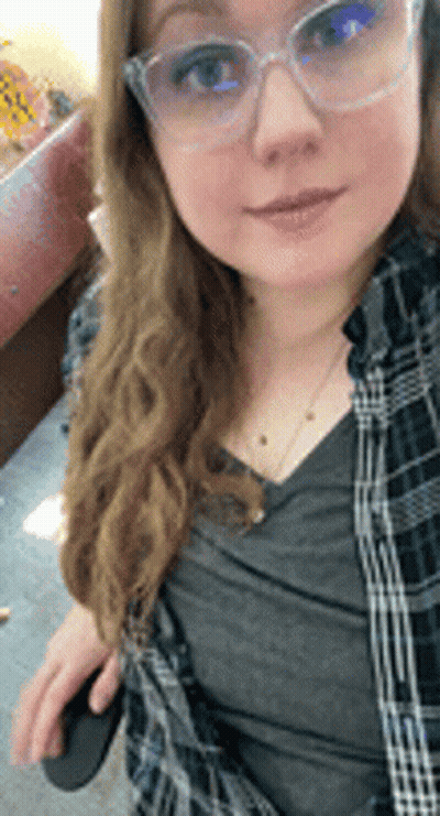Woman In Glasses And Plaid Shirt GIF
