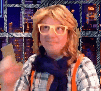 Woman In Glasses And Plaid Shirt In City GIF