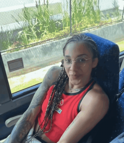 Woman In Glasses And Red Coca Cola Tank Top GIF