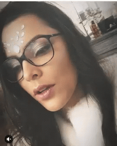 Woman In Glasses And White Sweater GIF