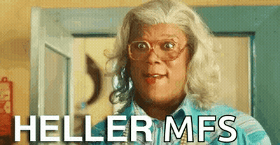 Woman In Glasses Blue Shirt Says Heller Mfs GIF